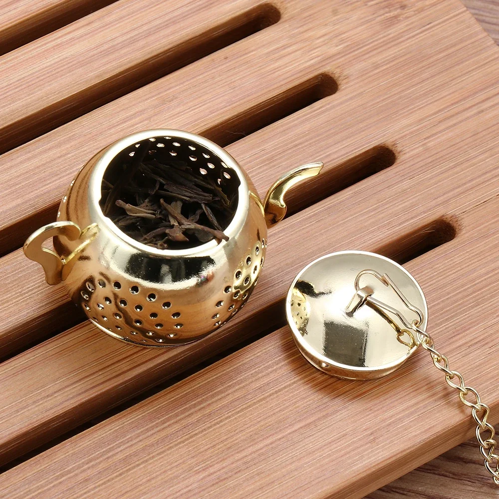 https://ae01.alicdn.com/kf/Sbb25ab6fbf1c4dfca772274930e8ea39B/Metal-Tea-Strainer-Teapot-Shape-Loose-Tea-Infuser-Stainless-Steel-Leaf-Tea-Maker-Strainer-Chain-Drip.jpg