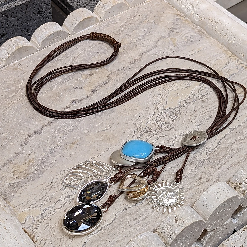 

Amorita boutique fashion design leap and sun necklace