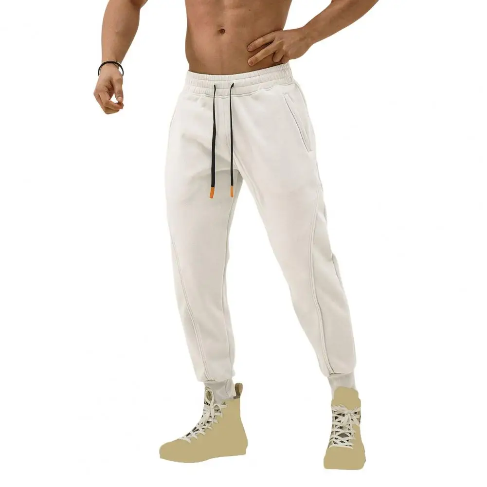 Description Picture 4 of itemMen Sport Pants Loose Ankle-banded Side Pockets Drawstring Elastic Waist Soft Breathable Solid Color Gym Traning Jogging Sweatpa