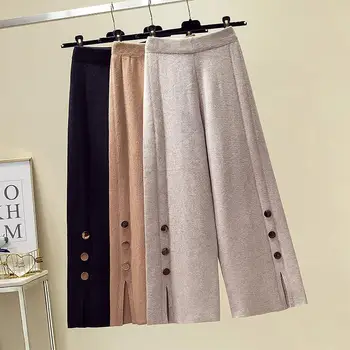 Pantaloni a gamba larga lavorati a maglia da donna eleganti ed esclusivi per l'inizio dell'autunno con spacco laterale dimagrante e copertura dei fianchi 1