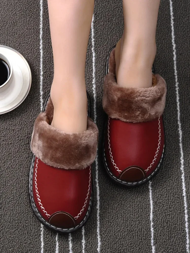 Warm cotton slippers indoor thick soled home shoes in winter Korean wool slippers for men and women couples leather slippers 2