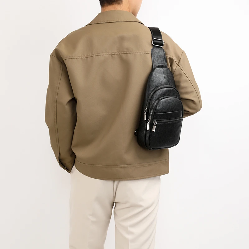 Stylish genuine leather sling bag for men with multiple compartments, ideal for everyday carry or travel