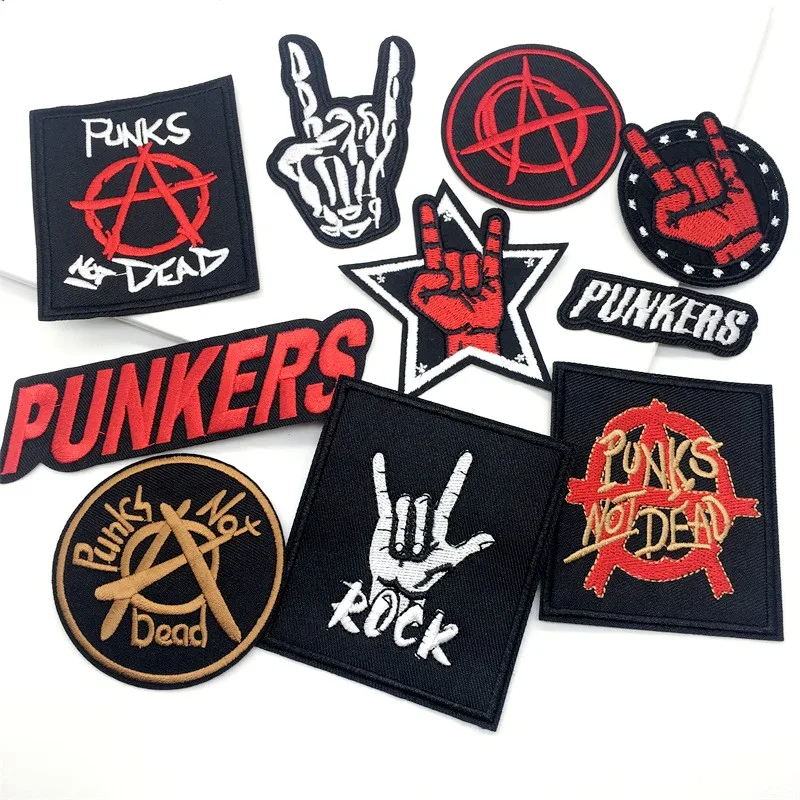 10 embroidered iron-on patches with punk rock themes including "Punks Not Dead", anarchy logos, hand horns, and star outlines