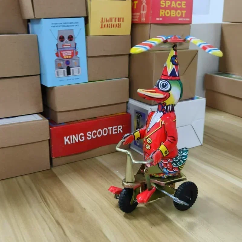 Adult Collection Retro Wind Up Toy Metal Tin Duck on Bike Robot Mechanical Clockwork Toy Figure Model Kids Baby Gift