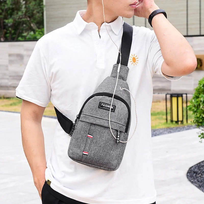 

Durable & Spacious Men's Sling Backpack - Multifunctional Travel & Sport Bag with Phone Charging Port & Earphone Hole