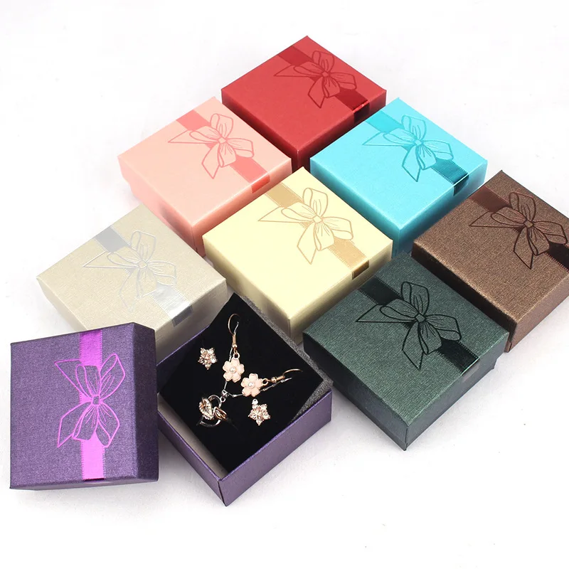 

Wholesale Bow Jewelry Packaging Box 12-Pack DIY Small 7x7x3.5cm Reflective Cardboard Gift Boxes Necklace Earrings Ring Package