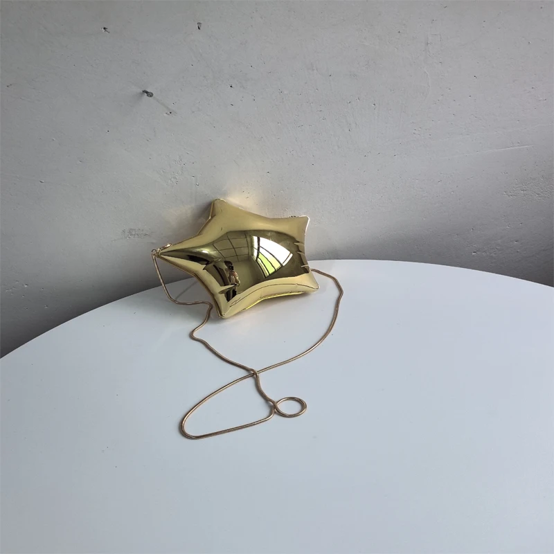thumbnail image 1 of Bolso de mujer nuevo 2024 con cadena de hueso de serpiente y estrella de nicho de acrílico dorado, bolso cruzado informal de un solo hombro a la moda para mujer, 1 of 5