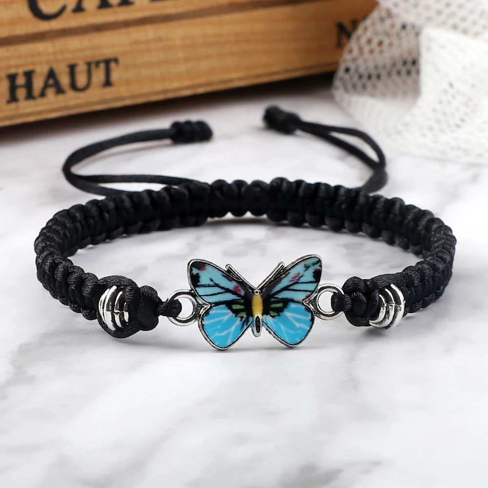 A Braided String Womens Bracelet with Butterfly Charm, a women's fashion accessory.