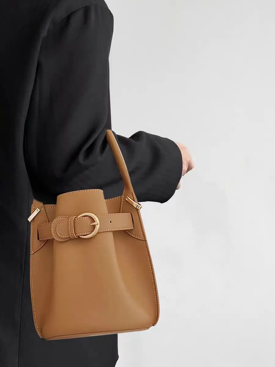 

Niche design solid color small fresh bucket bag ins style high-end pleated one-shoulder crossbody bag French retro piano handbag