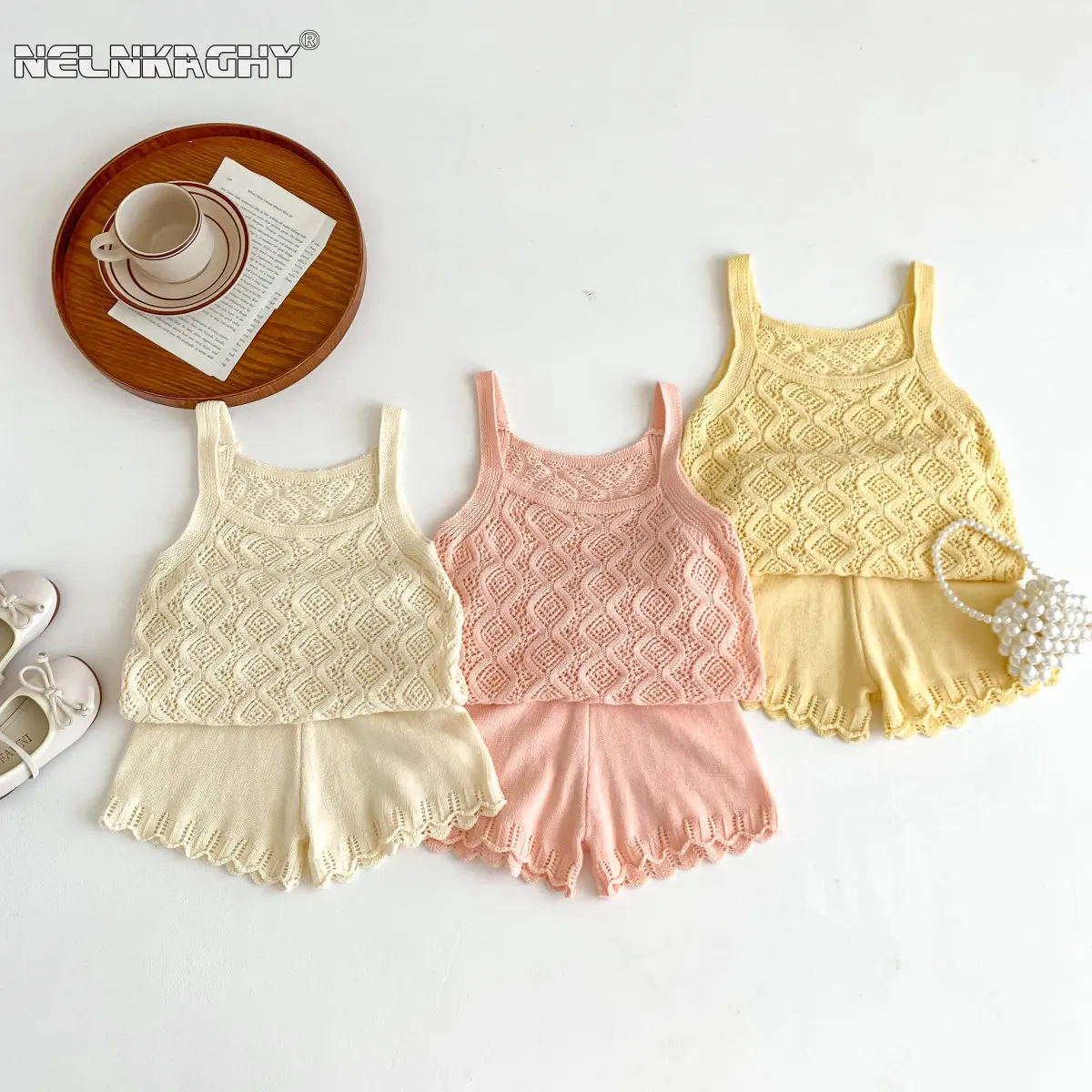

2023 Summer New In Kids Baby Girls Sleeveless Knitted Solid Color Hollow-out Top + Ruched Shorts Children Fasion Clothing Set