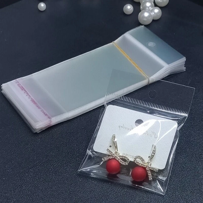 Description Picture 2 of item100 transparent plastic hanging self-adhesive bags, OPP self sealing bags, jewelry candy bags, gift biscuit sales bags