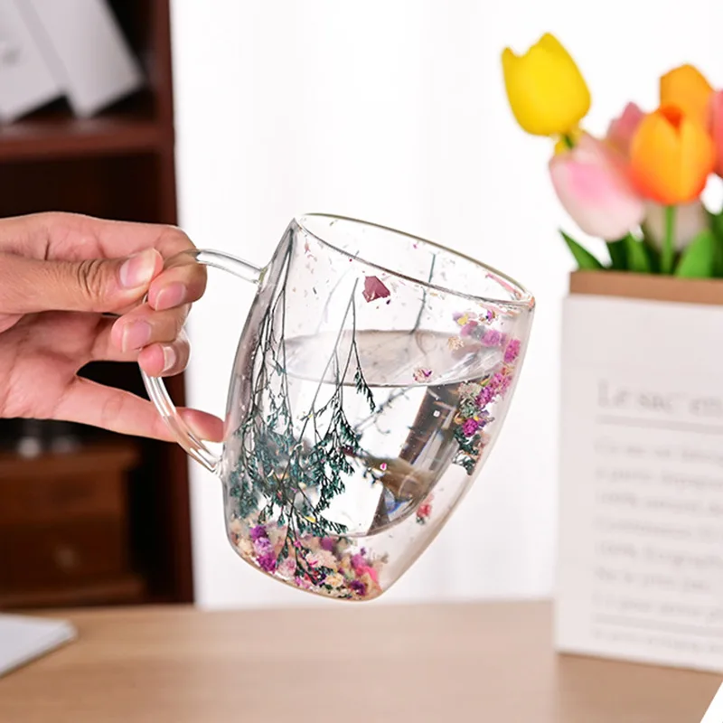 https://ae01.alicdn.com/kf/Sbc198ca1497f4d7783e2df508ca62317L/Dried-Flower-Double-Wall-Clear-Glass-Coffee-Mugs-Double-Insulated-Glass-Cup-For-Hot-Cold-Beverages.jpg