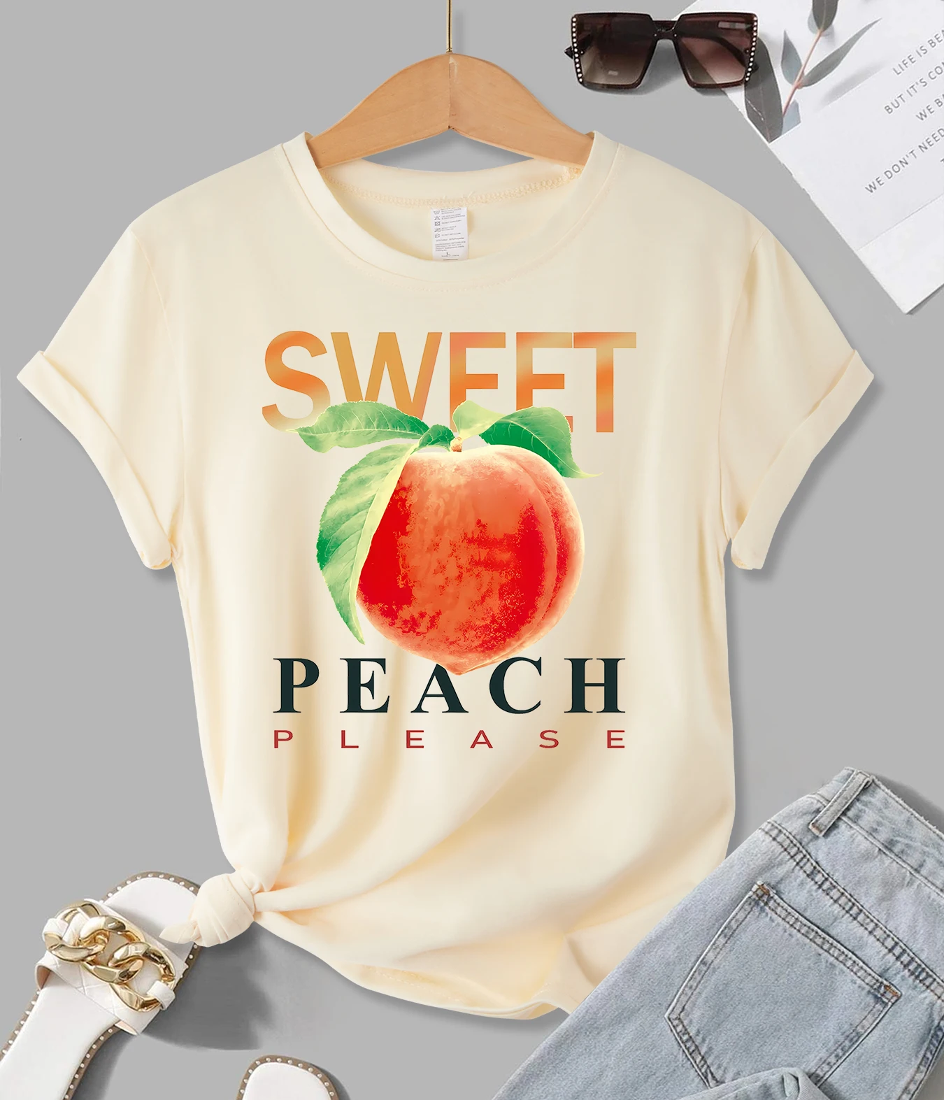 Peach manifesting my dream like a hallmark movie women’s cropped hoodie. main image 0