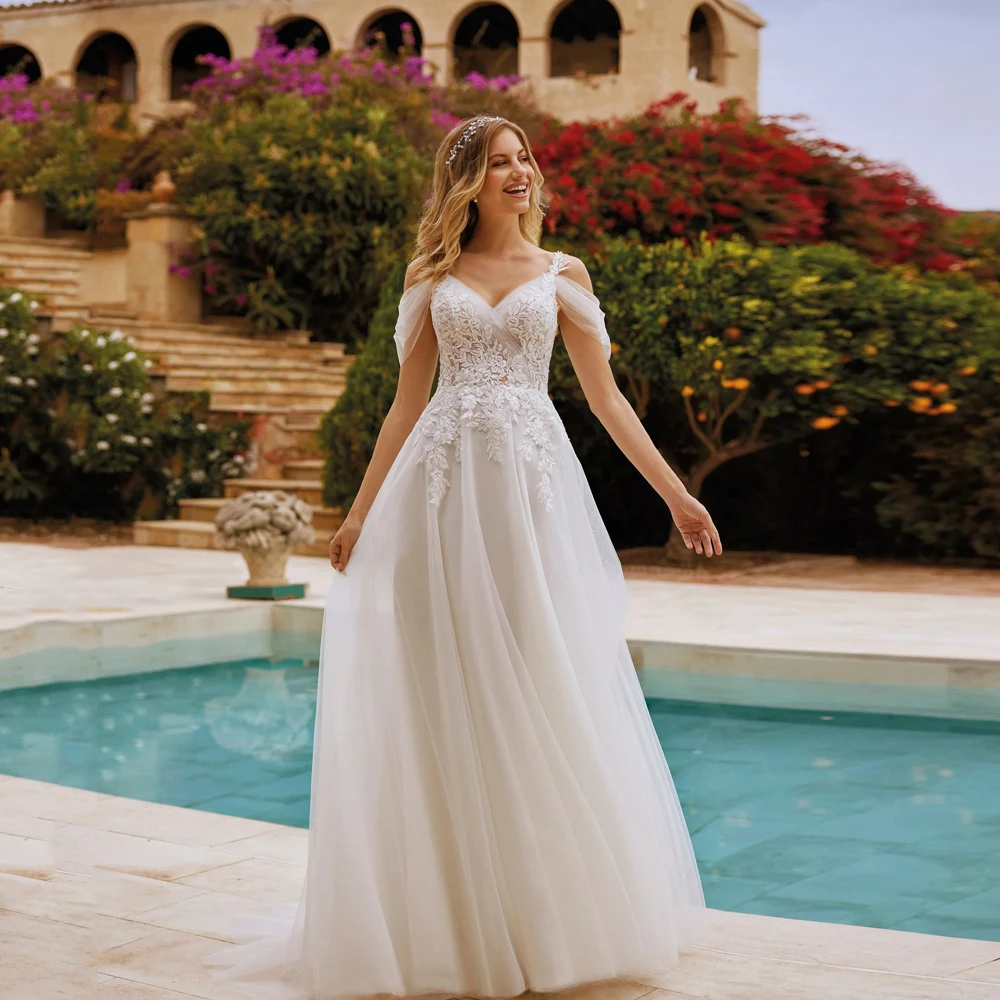 

Elegant Spaghetti Straps Wedding Dresses V Neck Sleeveless Bridal Gowns Appliques Floor Length A-Line Tulle Vestidos De Novia