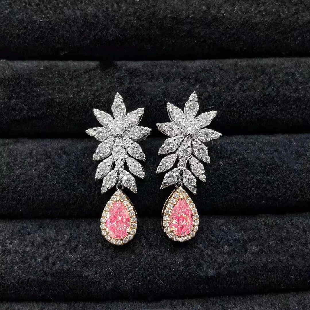 Buy Pink Stone And Cubic Zirconia Embellished Tear Drop Earrings by Minaki  Online at Aza Fashions.