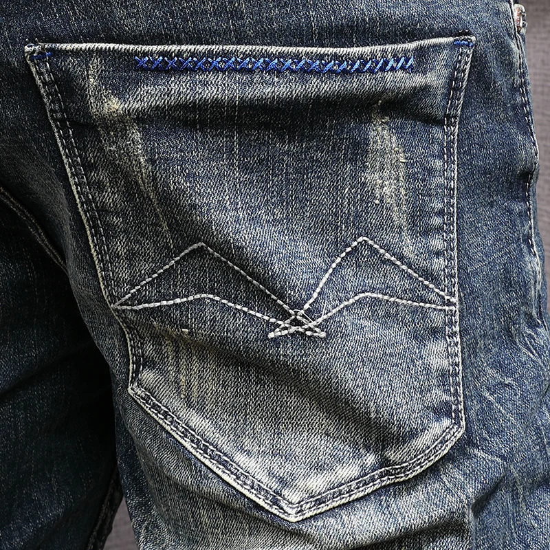 Рисунок 6 - Джинсы мужские зауженные рваные с вышивкой