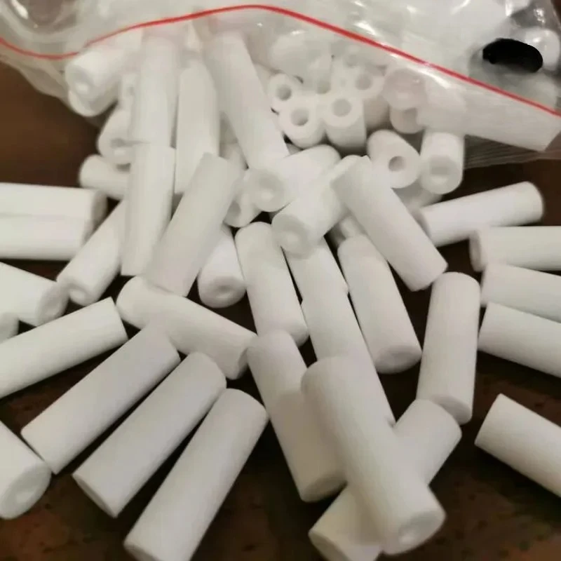 Gros plan sur un filtre 9/4x27mm pour injecteur poudre IG07, montrant le filetage et la maille fine