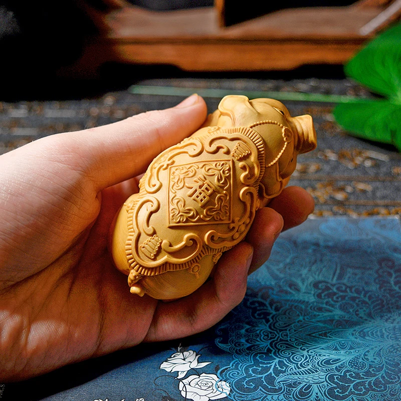 

Boxwood carving of Chinese Zodiac with small leaves Fuxi pig carving men's portable stationery hand playing handicraft ornaments
