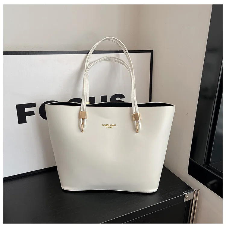 Large capacity women's handbag 2026, modern new shoulder bag versatile for travel, underarm bag made of soft polyurethane material...