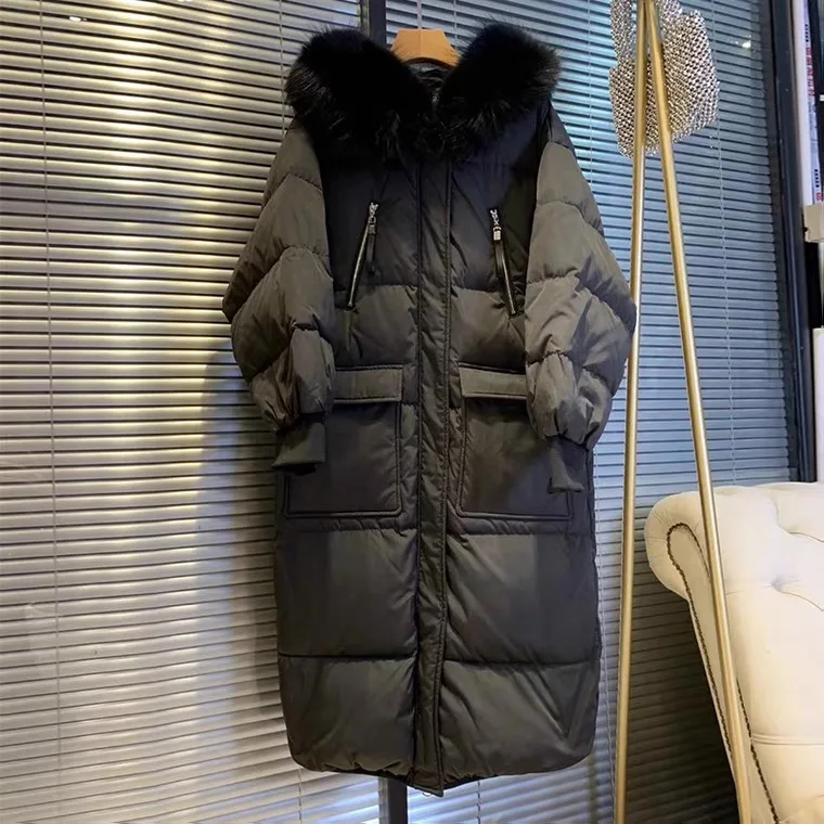 Рисунок 5 - Женский пуховик с воротником из меха енота