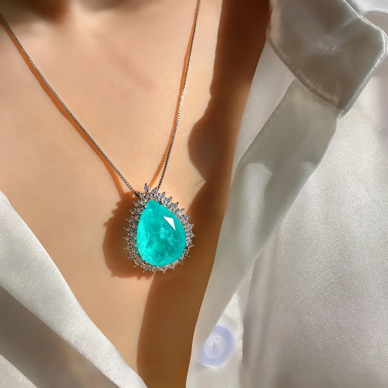 

Micro Inlaid Paraiba Water Drop Gem Necklace Female Ocean Heart Pendant Long Cross-Border Sweater Chain Female