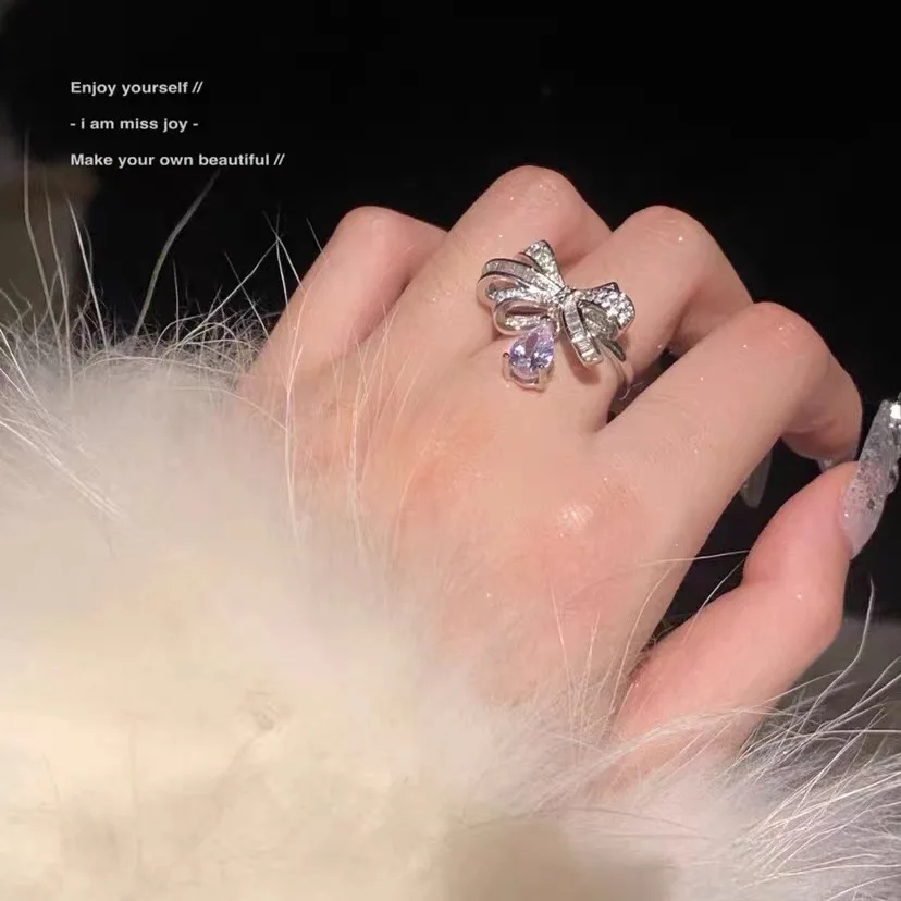 2023 Women Brilliant Bow Tie Earrings Plated 18K Gold Exquisite Water Drops Exaggerate Necklace Ring 3