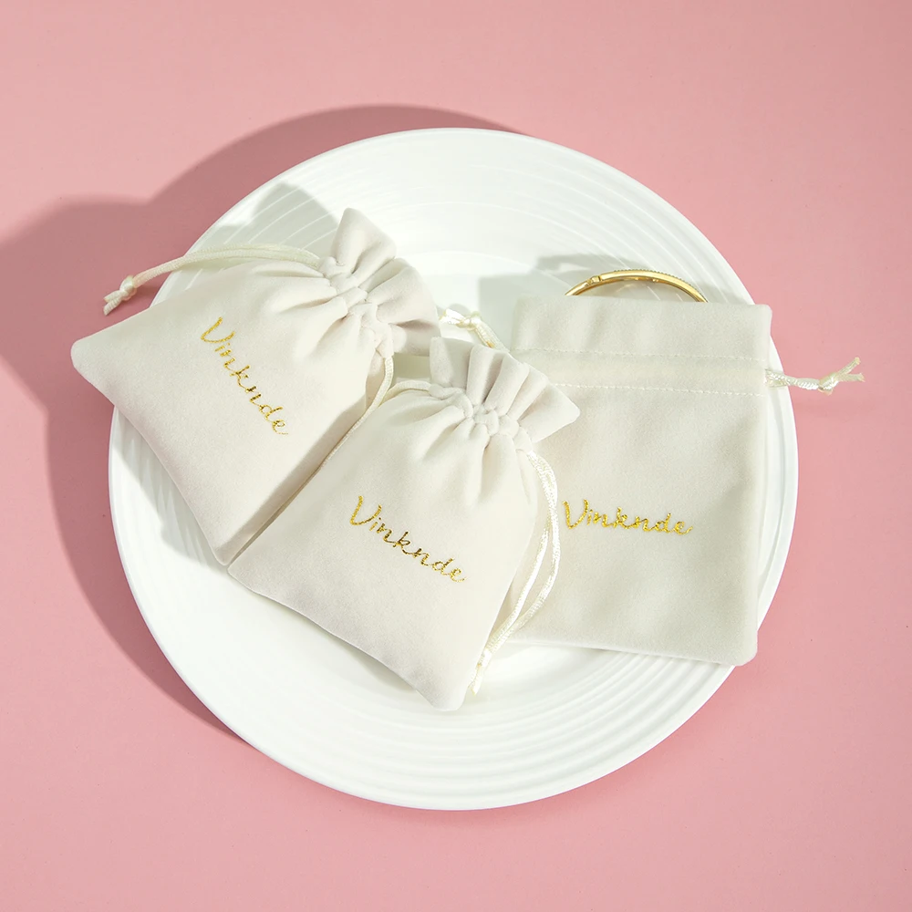 

100Pcs Custom Logo Beige Velvet Jewelry Drawstring Bag for Ring Earring Bracelet Pendant Wedding Favors Candy Dustproof Pouch