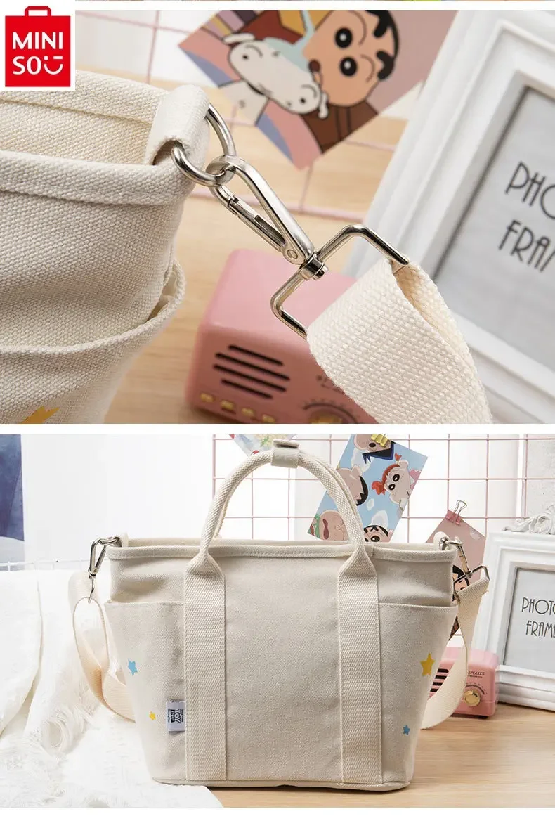 MINISO Disney cartoon three eyed pendant cute handbag women's fashionable high-quality canvas carrying crossbody bag