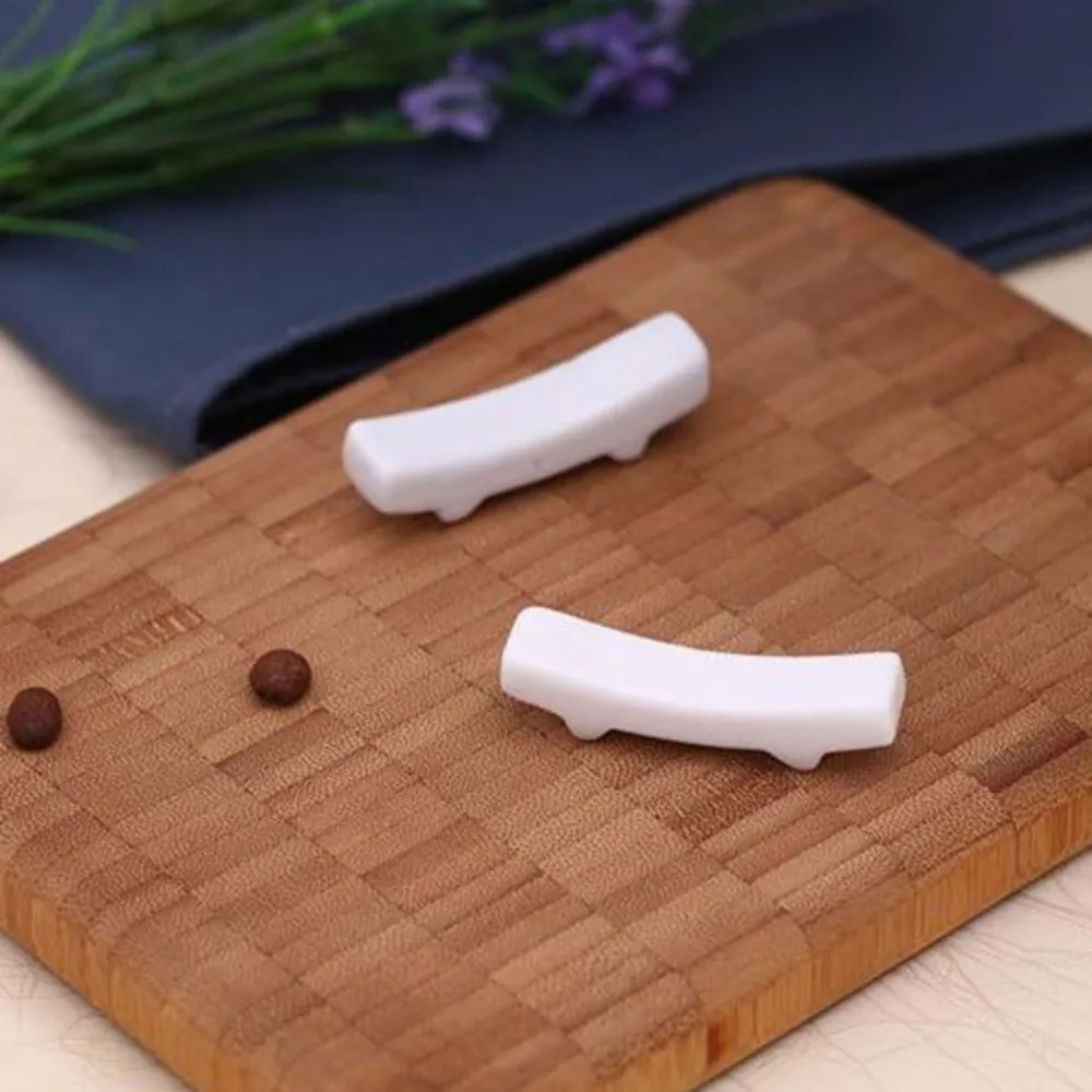 

100pcs Pure White Ceramic Chopsticks Holder Rack Chopsticks Holder Mat Chopsticks Care Fashion Kitchen Tableware