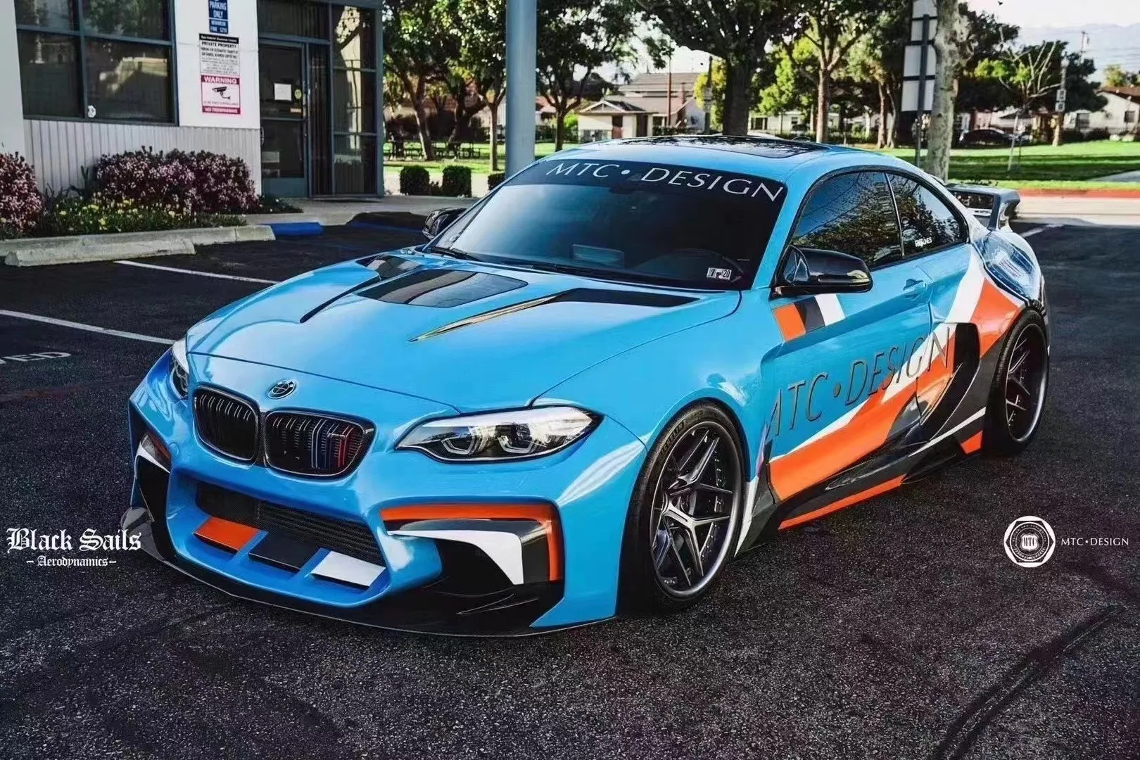 A highly customized and lowered bmw f22 with a widebody kit on Craiyon