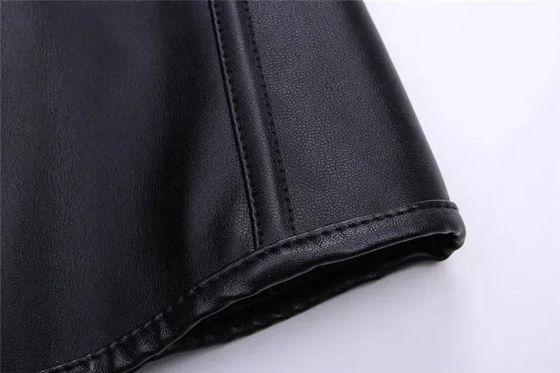 Back view showing adjustable straps and structured black fashion design