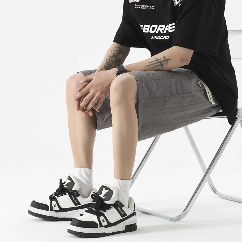 Large size casual shorts, quick drying and breathable capris, men's large size loose trendy casual sports ice silk pants