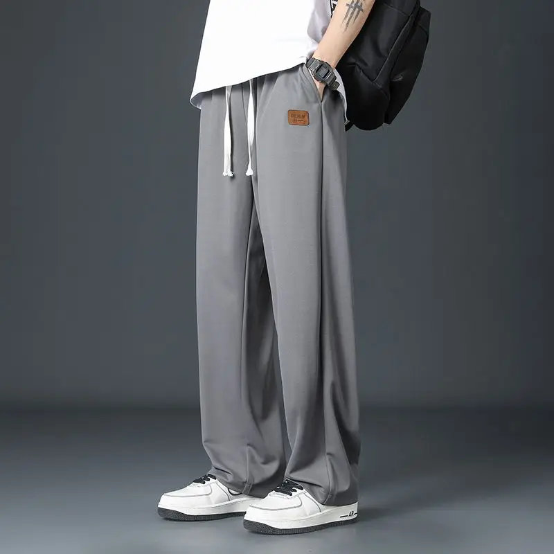 Spring Summer Men Oversize Casual Pants Fashion Male Drawstring Elastic Waist Solid Loose Sports Wide Leg Straight Trousers wide leg pants