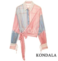 Chemise rayée élégante et unique KONDALA pour femme, avec nœud à la taille, transparente, collection été 2026, style urbain, idéale pour les vacances 1
