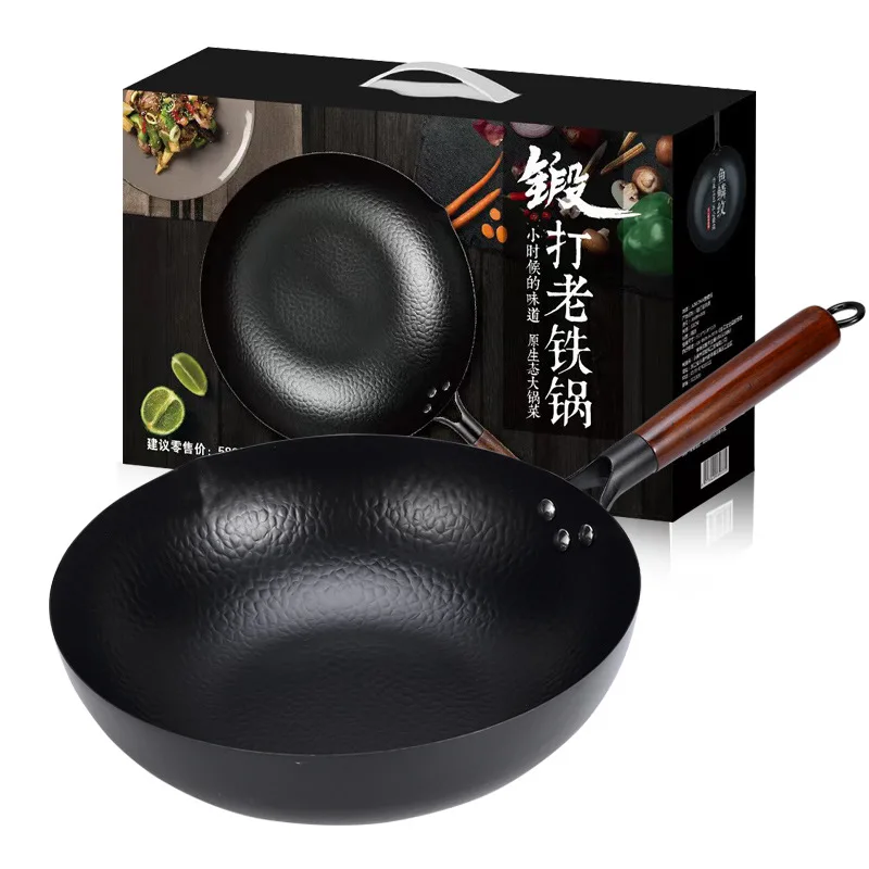 Non-stick flat bottomed stir fry pan with ergonomic handle.
