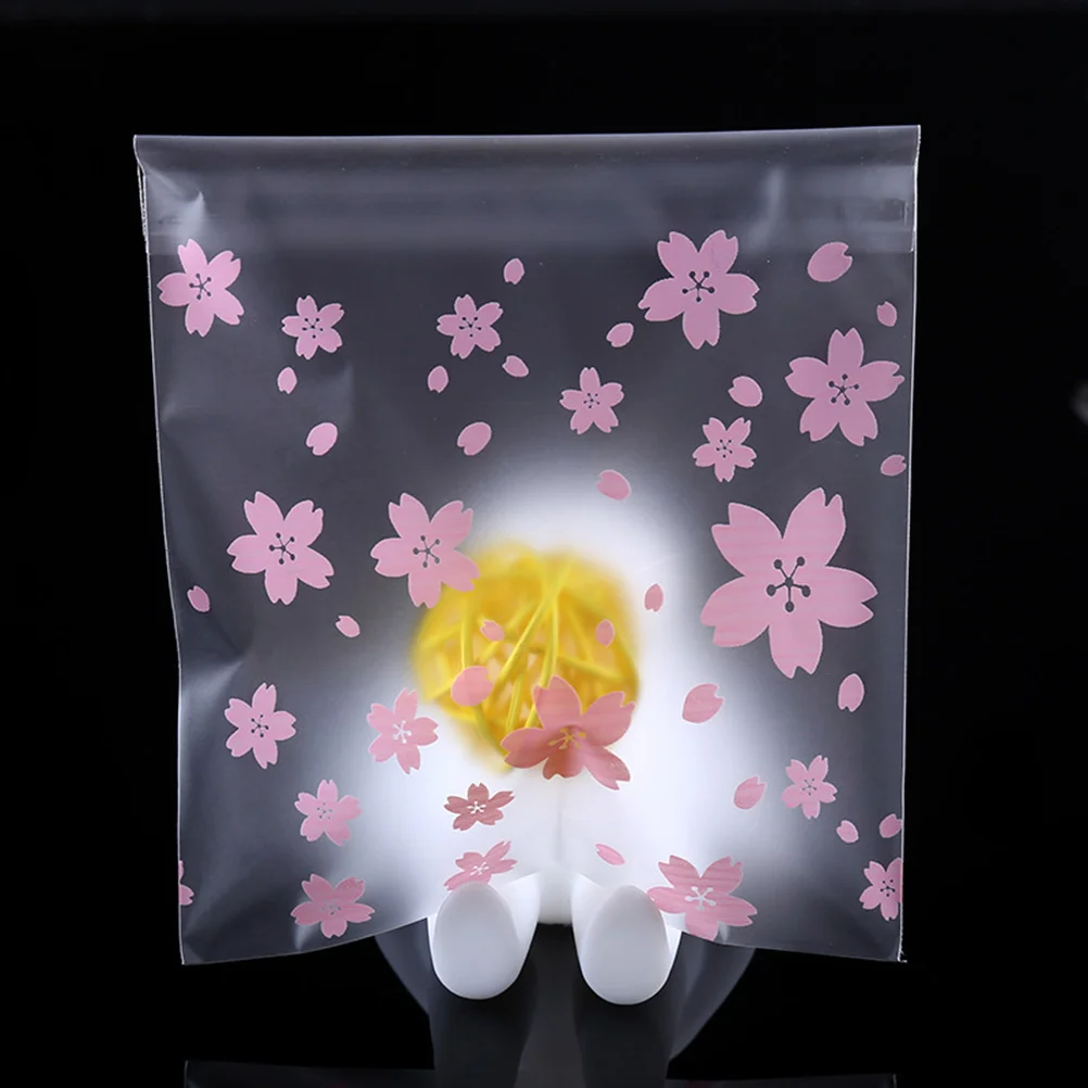 

100pcs Matte Flower Pattern Plastic Bag Transparent Gift Bags Self-adhesive Seal Pouch for Candy Cookie Dessert Packaging (Pink)