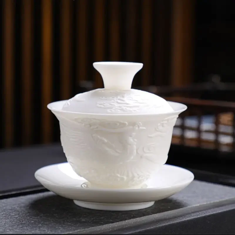 White Porcelain Kung Fu Tea Set White Jade Relief Tureen Ceramic Business Gift Simple Portable Dragon and Phoenix Cups Gaiwan tea set