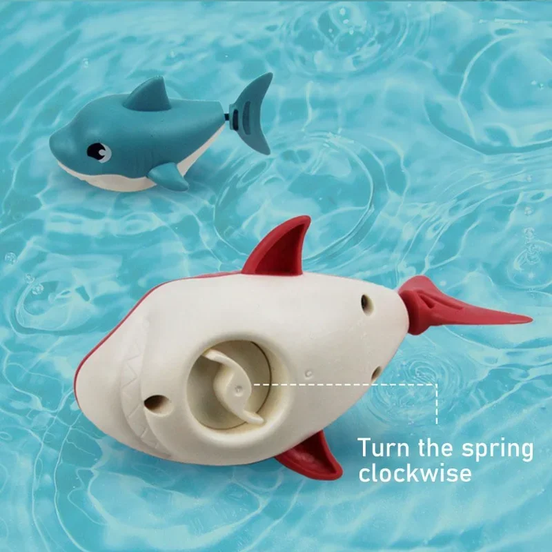 1PCS Toddler Bath Toys Cute Cartoon Swimming Shark Clockwork Wagging Tail Rotating Device Beach Baby Bath Tub Wind Up Toy 5