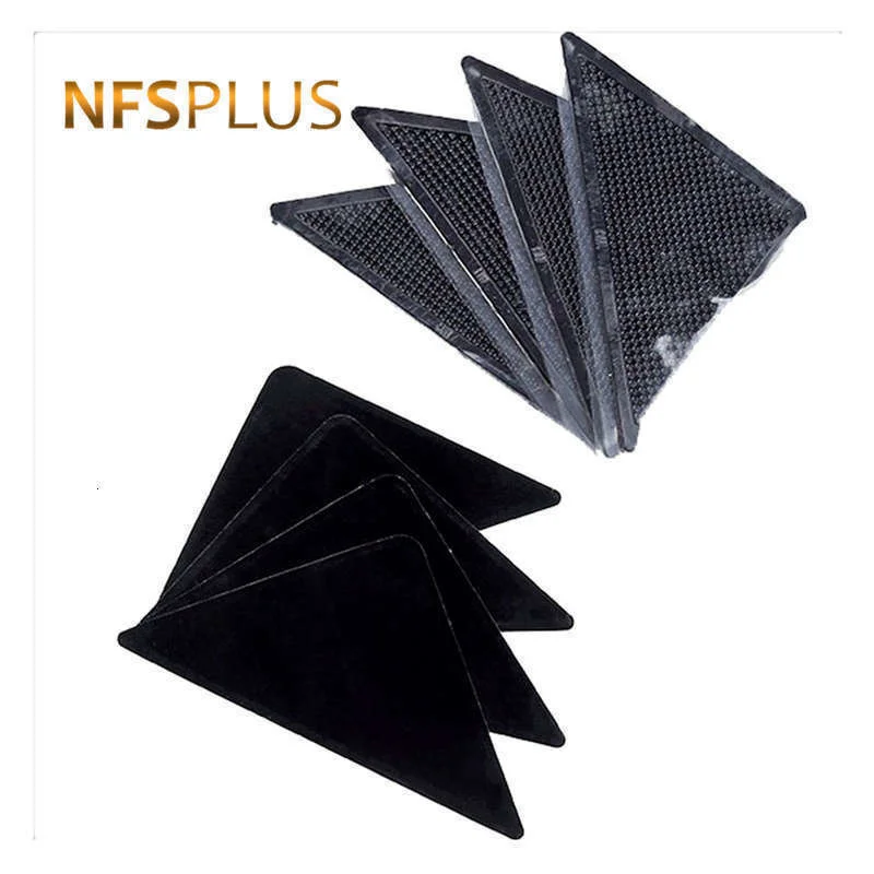 4-Pack-Sticky-Mat-Carpet-Rug-Grippers-10-5x10-5x15cm-Triangle-Anti-Slip-Silicone-Washable-Reusable (1).jpg