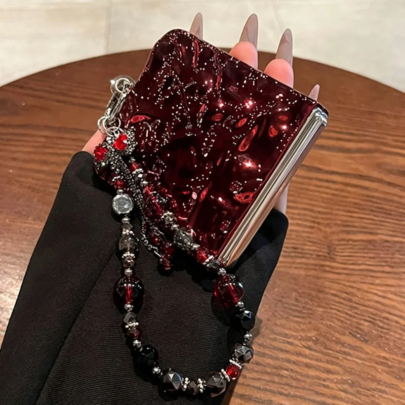 Luxury Electroplated Wrinkled Wine Red Case with Tassel Bow and Beaded Chain