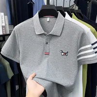 Polo de luxe pour homme à manches courtes de haute qualité, broderie chiot sur le col, rayures sur les poignets, t-shirt décontracté et professionnel pour homme 2