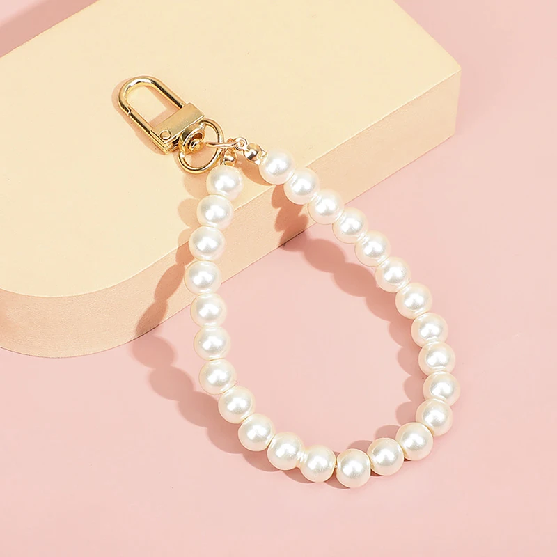 Perlen Perlen Legierung Schlüssel anhänger für Frauen neue minimalist ische Auto tasche Bluetooth Headset Schlüssel ringe Anhänger Schmuck Zubehör – Detail 1