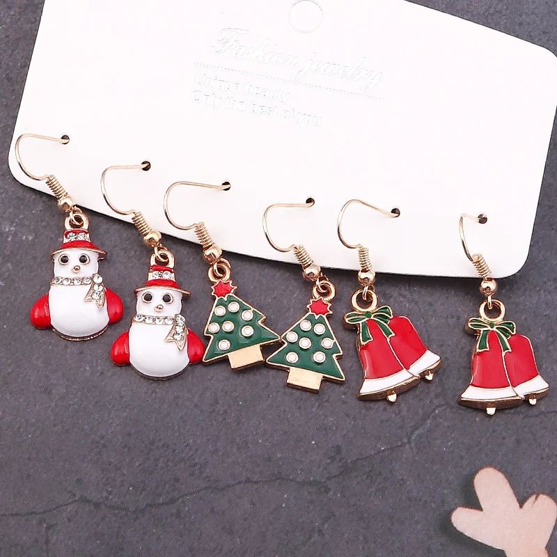 Juego de 5 pares de aretes navideños para niñas, regalos navideños para mujeres, árbol de Navidad, caja de regalo con copo de nieve, calcetín de muñeco de nieve, Papá Noel | Bodega