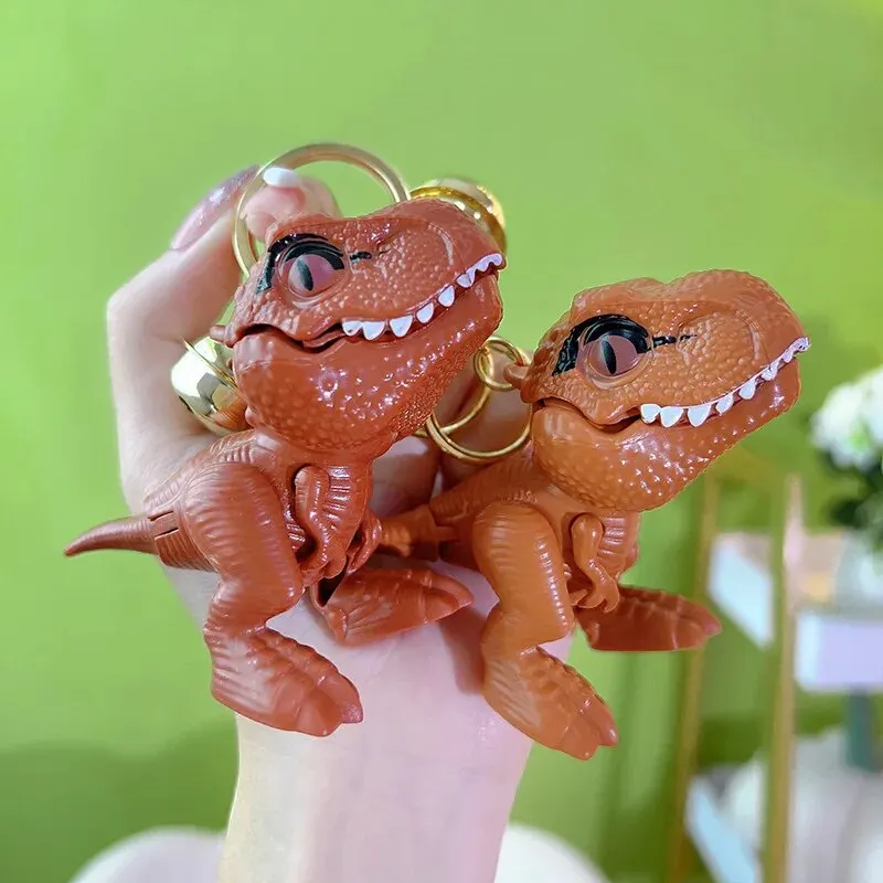1 Pcs New Tyrannosaurus Rex Bite Hand Toy Keychain Creative Dinosaur Pendant Couple Backpack Pendant Small Gift 2
