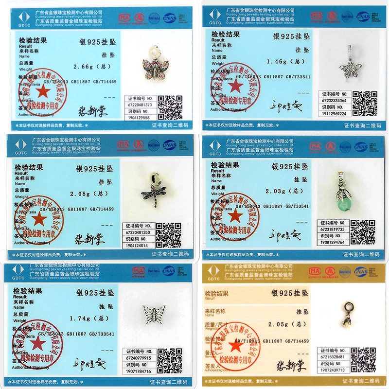 Close-up of bee and butterfly silver charms