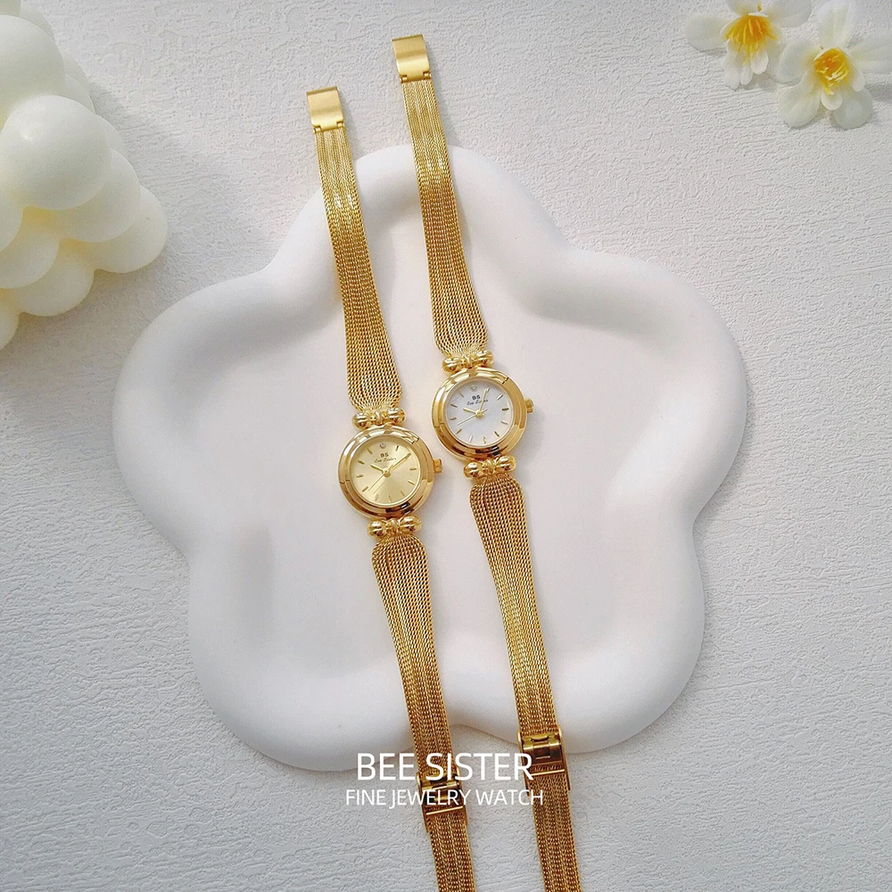 ساعة نسائية ذهبية عتيقة بحزام شبكي مقاوم للماء كوا...