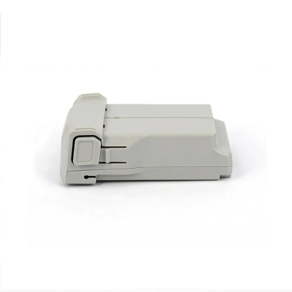 Batterie drone 3850mAh placée à côté d'un DJI Mini 4 Pro, montrant la compatibilité