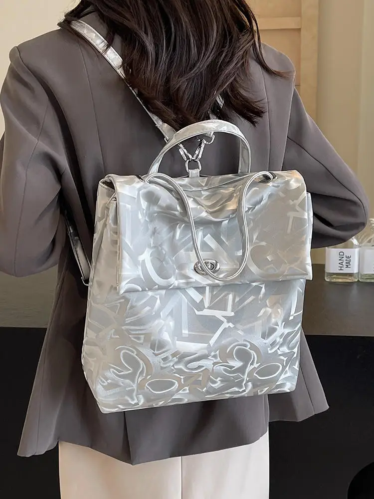 

Новинка 2024, женские рюкзаки, серебристые сумки через плечо, школьные ранцы для студентов, дорожный рюкзак с лазерным рисунком, роскошный брендовый кожаный