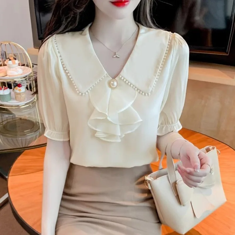 

Women's 2024 Summer New Pullover Doll Neck Spliced with Ruffle Button Fashion Solid Color Casual Short Sleeve Chiffon Shirt