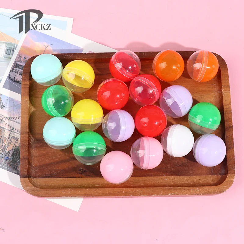 

100Pcs Plastic Empty Toy Vending Capsules Half Clear Half Color Round Ball